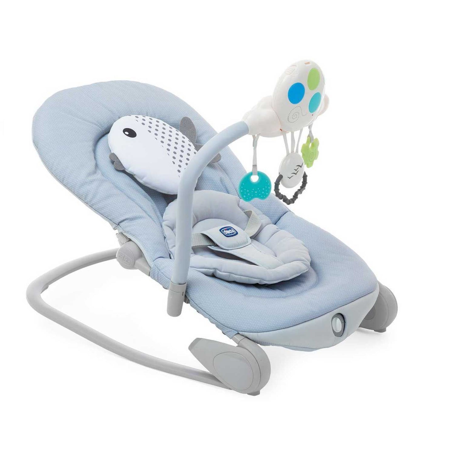 A blue baby bouncer with a white fish-shaped headrest and a hanging mobile with colorful toys.