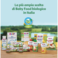 HiPP's diverse selection of organic baby food is displayed on a wooden table, showcasing milk, purees, snacks, and cereals. 
