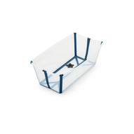 Clear plastic baby bathtub with blue trim and a black drain plug. 
